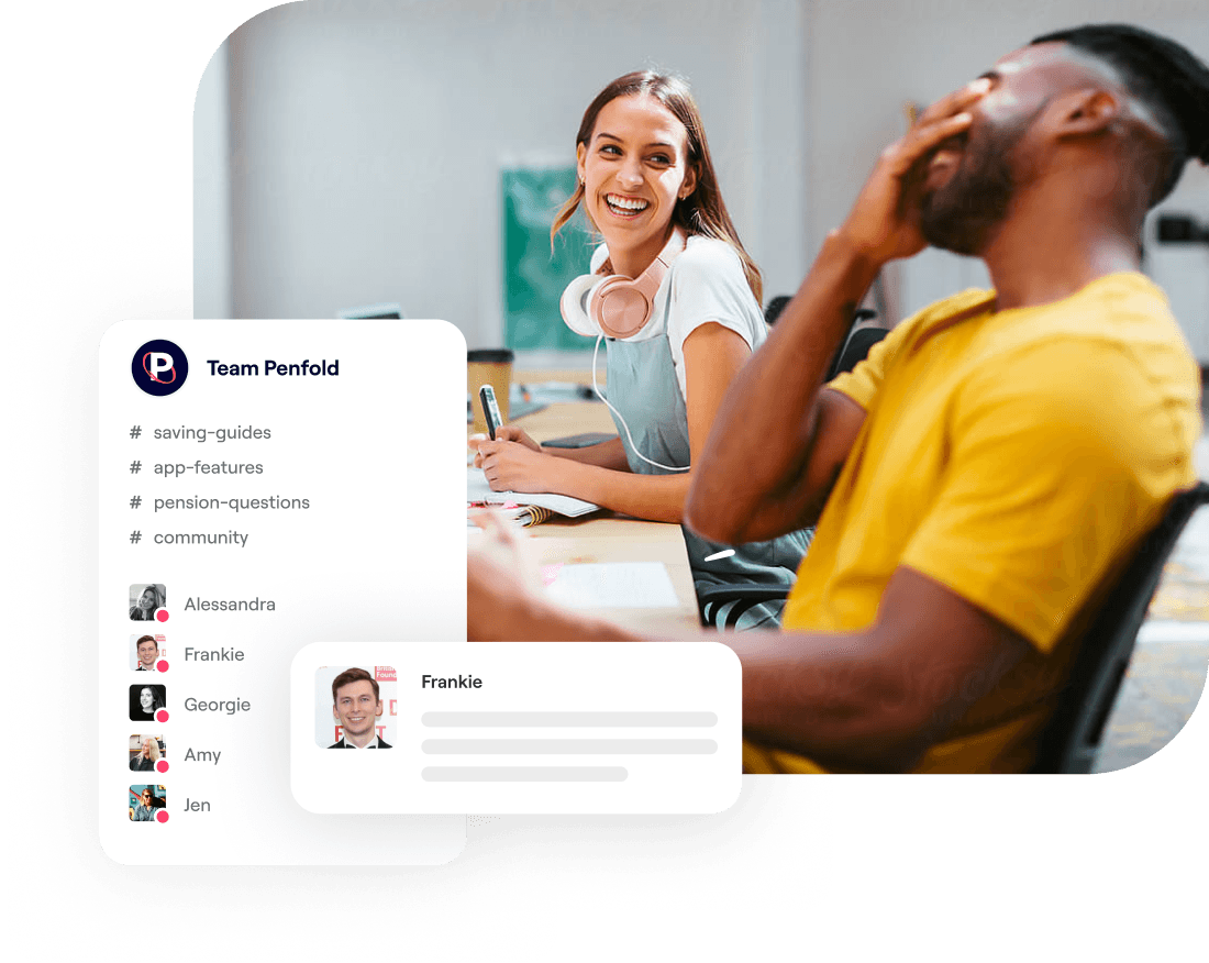 A photo of a man and a woman laughing while sat at a desk