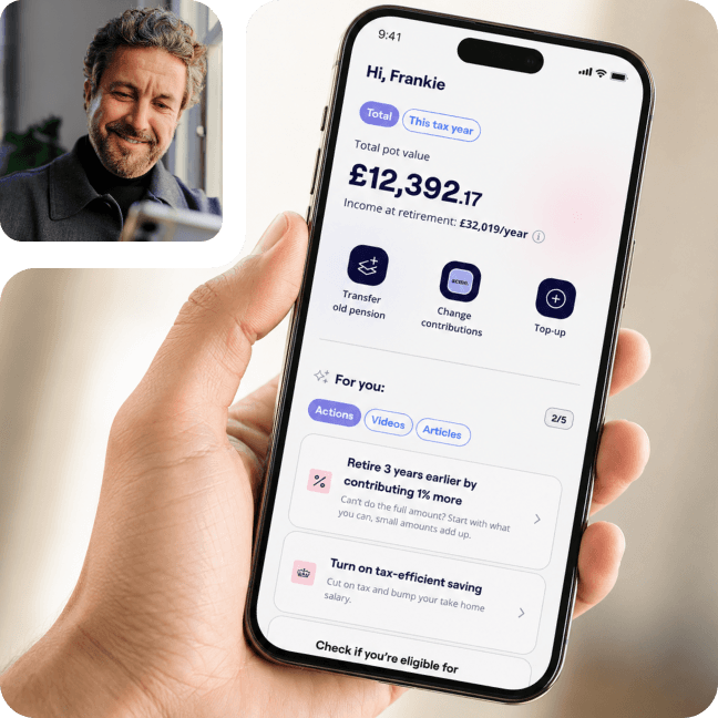 A hand holds a smartphone displaying a financial app for retirement savings, with a smiling man looking at a phone in the background.